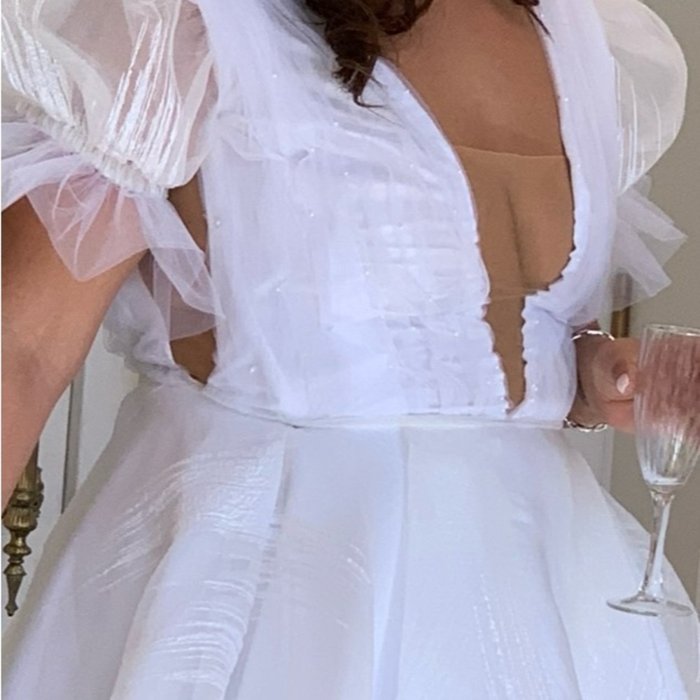 Elegant White Dress with Sheer Sleeves